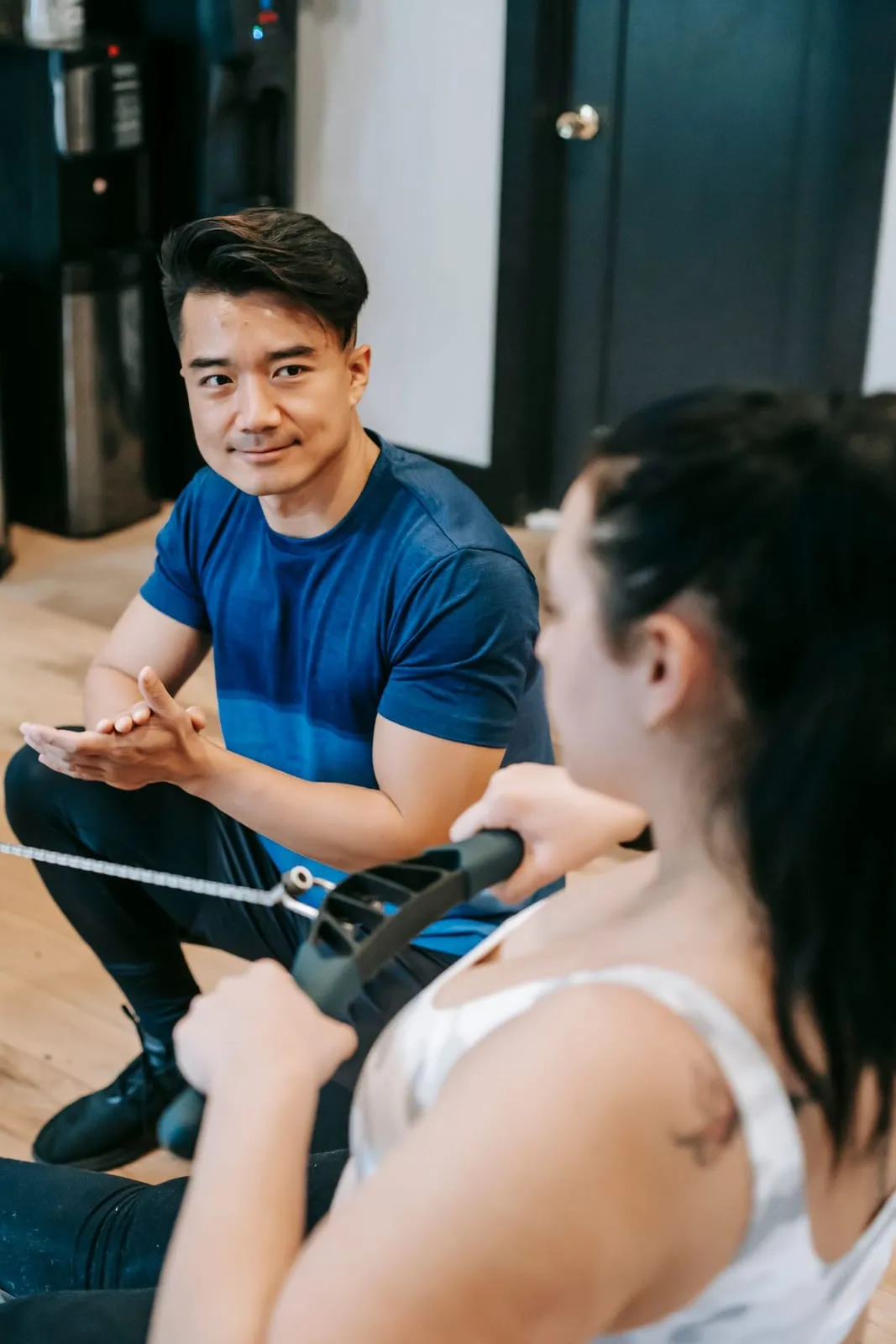 Boxing coach Nima Rai guiding a member