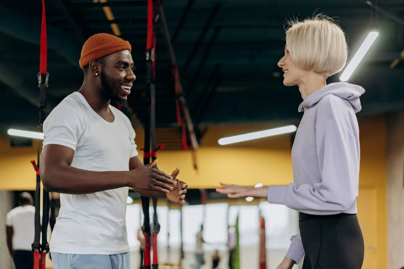 Lena meeting her boxing coach in the gym on her first visit