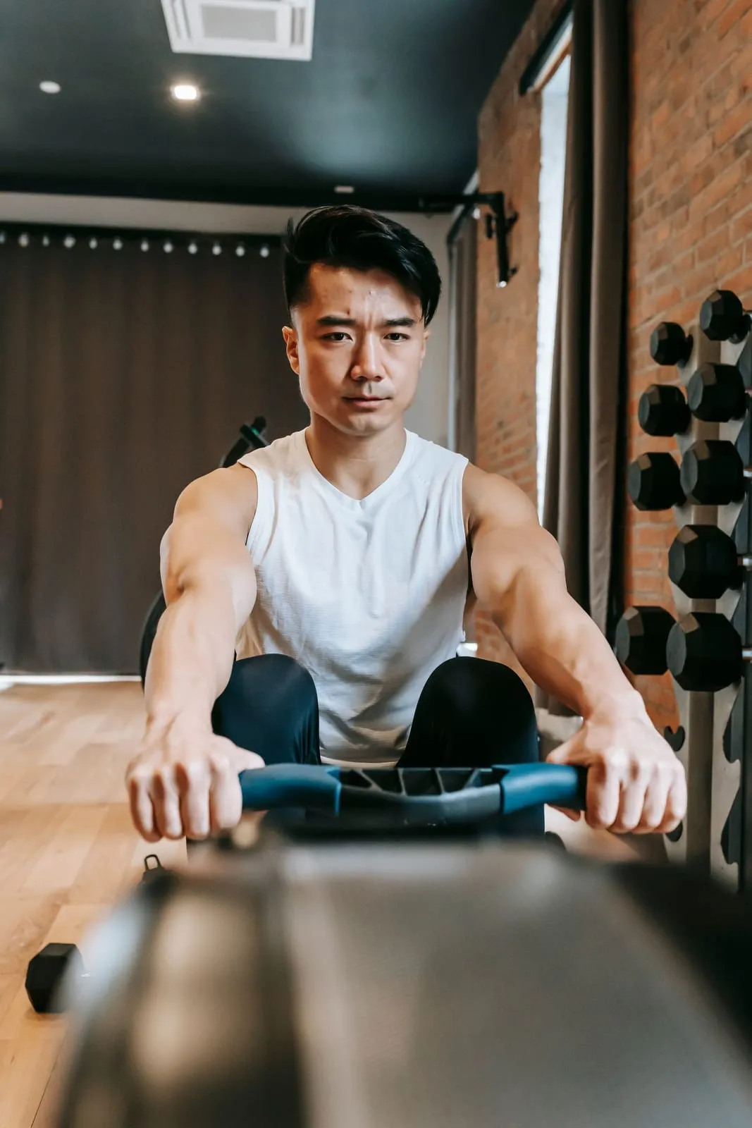Rohan on the rowing machine at the gym